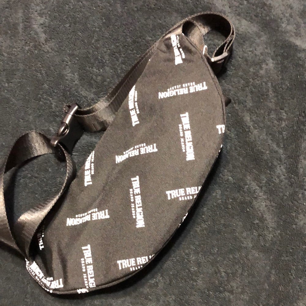 Black and white True Religion Fannie pouch.